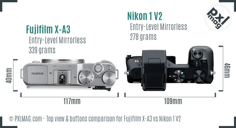 Fujifilm X-A3 vs Nikon 1 V2 top view buttons comparison Fujifilm X-A3 vs Nikon 1 V2 top view buttons comparison