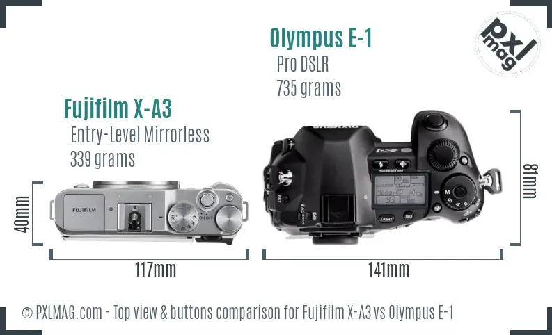 Fujifilm X-A3 vs Olympus E-1 top view buttons comparison
