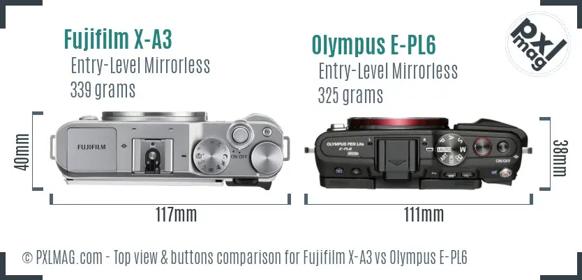 Fujifilm X-A3 vs Olympus E-PL6 top view buttons comparison