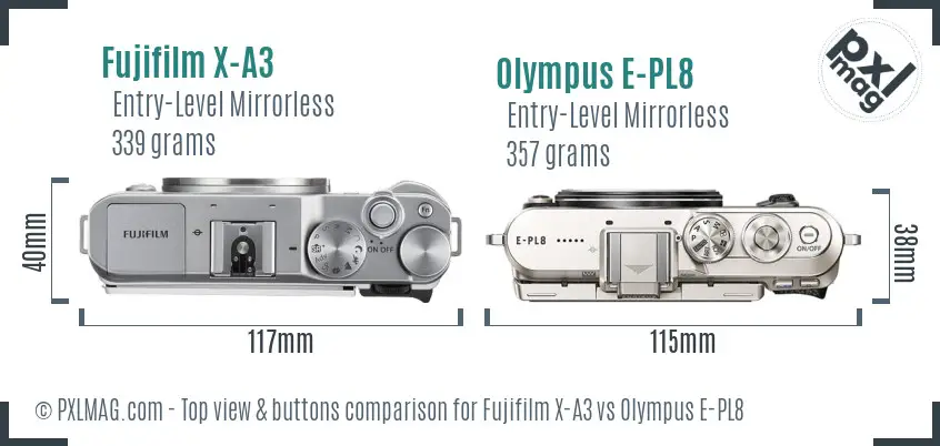 Fujifilm X-A3 vs Olympus E-PL8 top view buttons comparison