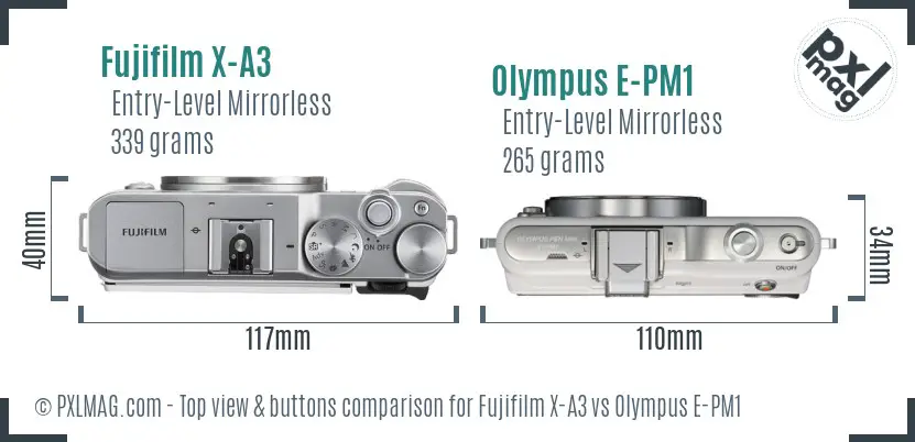 Fujifilm X-A3 vs Olympus E-PM1 top view buttons comparison Fujifilm X-A3 vs Olympus E-PM1 top view buttons comparison