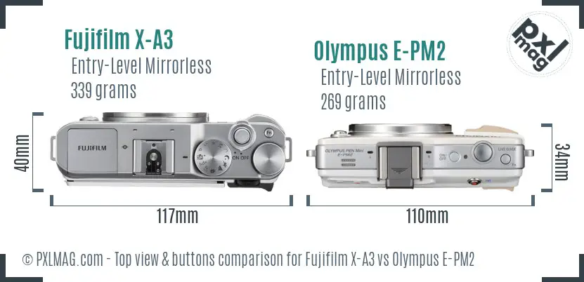 Fujifilm X-A3 vs Olympus E-PM2 top view buttons comparison