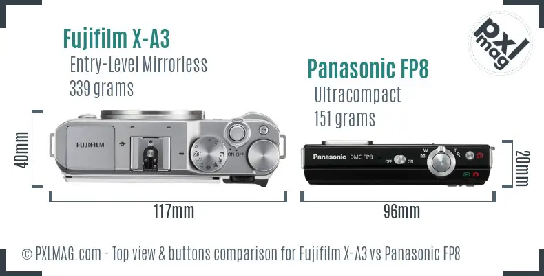 Fujifilm X-A3 vs Panasonic FP8 top view buttons comparison