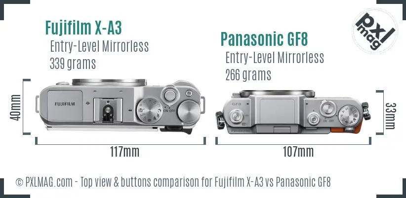 Fujifilm X-A3 vs Panasonic GF8 top view buttons comparison