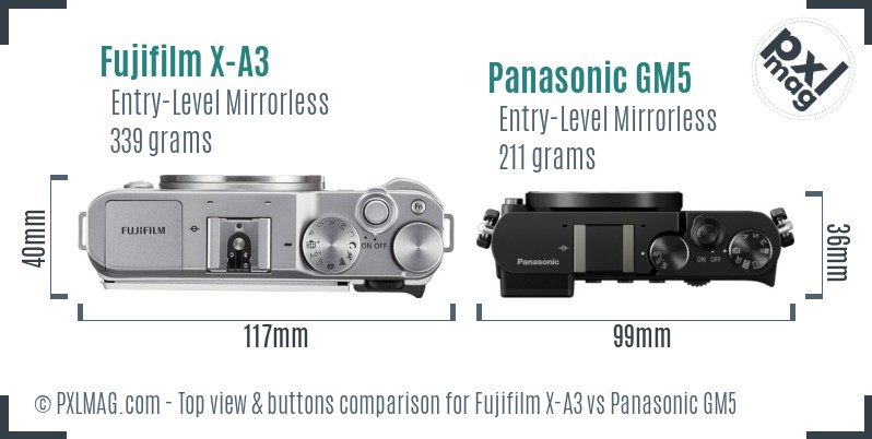 Fujifilm X-A3 vs Panasonic GM5 top view buttons comparison