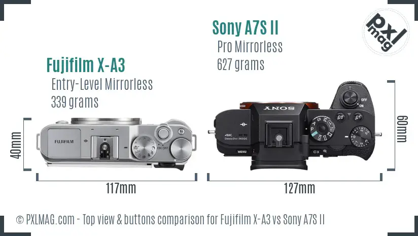 Fujifilm X-A3 vs Sony A7S II top view buttons comparison