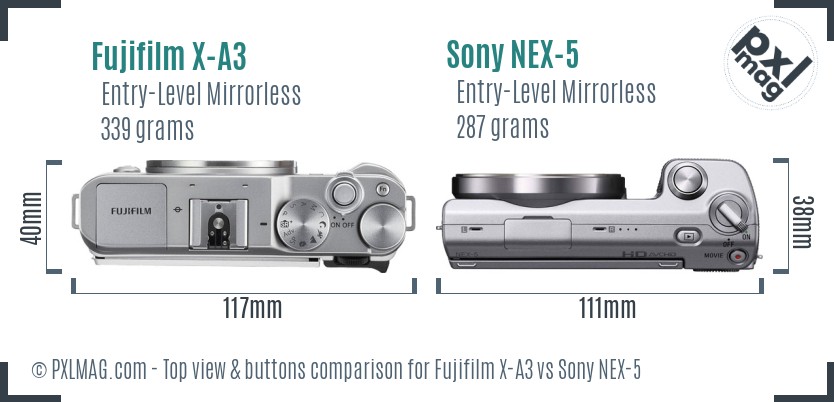Fujifilm X-A3 vs Sony NEX-5 top view buttons comparison