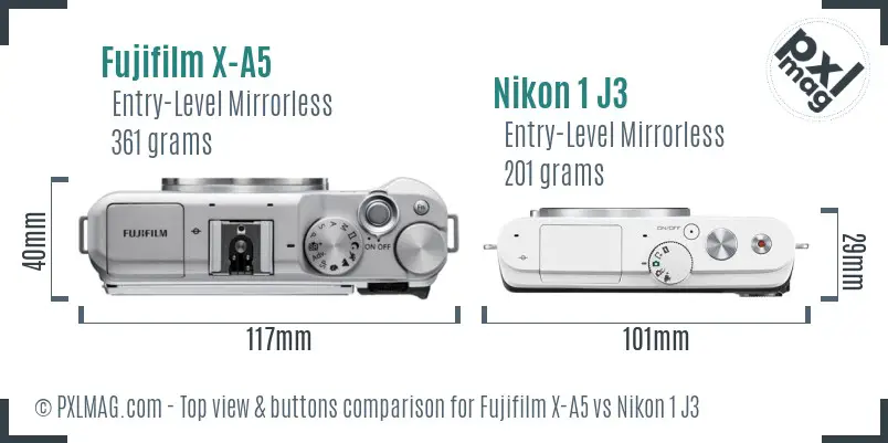 Fujifilm X-A5 vs Nikon 1 J3 top view buttons comparison