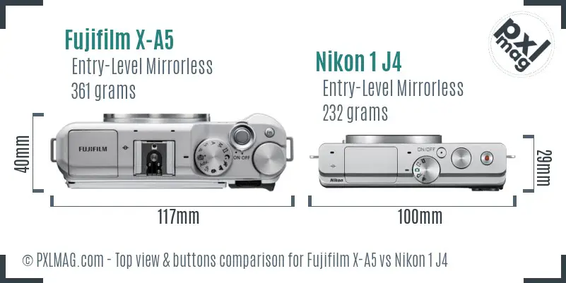 Fujifilm X-A5 vs Nikon 1 J4 top view buttons comparison