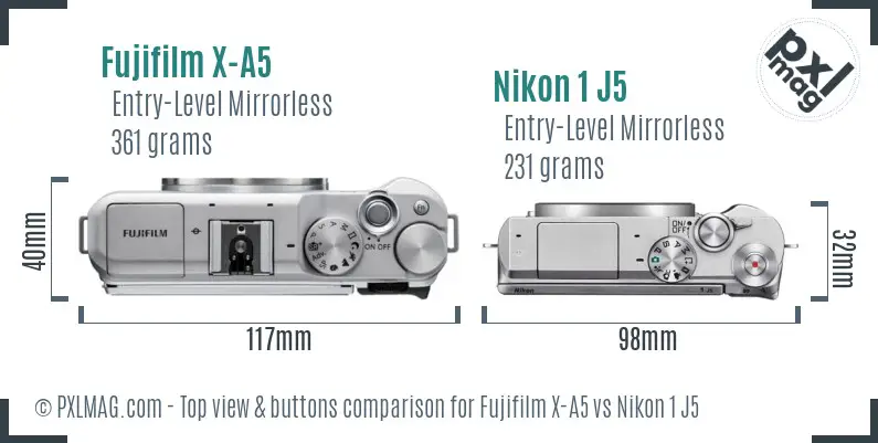 Fujifilm X-A5 vs Nikon 1 J5 top view buttons comparison