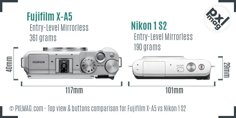 Fujifilm X-A5 vs Nikon 1 S2 top view buttons comparison