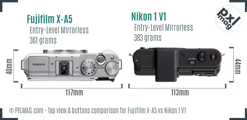 Fujifilm X-A5 vs Nikon 1 V1 top view buttons comparison