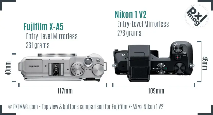 Fujifilm X-A5 vs Nikon 1 V2 top view buttons comparison