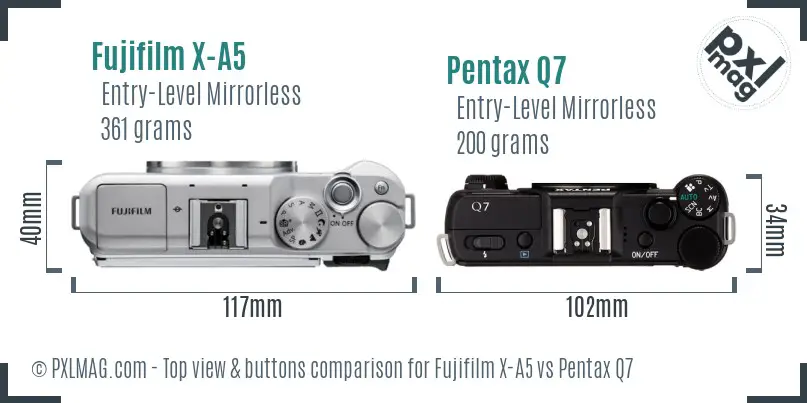 Fujifilm X-A5 vs Pentax Q7 top view buttons comparison