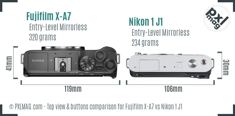 Fujifilm X-A7 vs Nikon 1 J1 top view buttons comparison