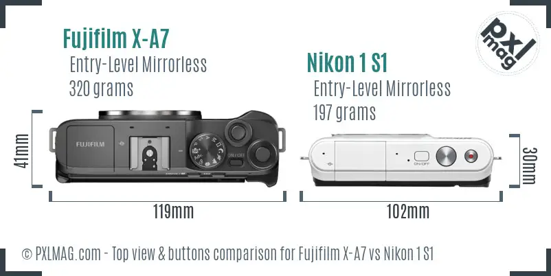 Fujifilm X-A7 vs Nikon 1 S1 top view buttons comparison
