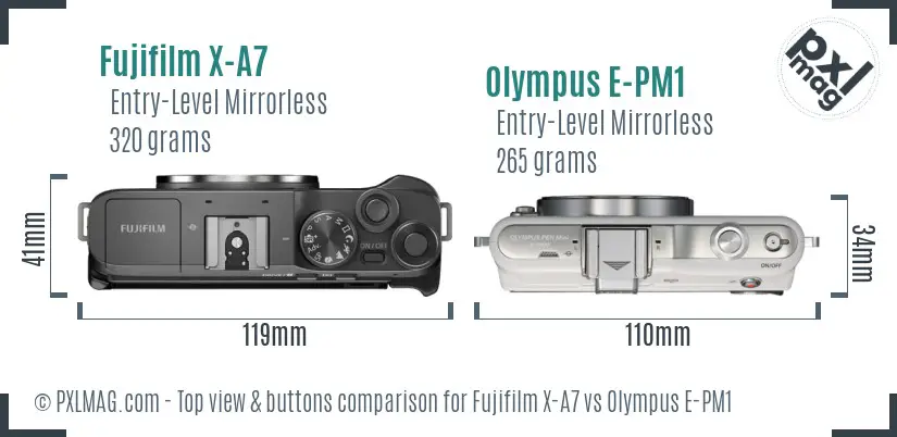 Fujifilm X-A7 vs Olympus E-PM1 top view buttons comparison
