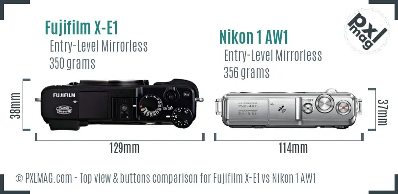 Fujifilm X-E1 vs Nikon 1 AW1 top view buttons comparison