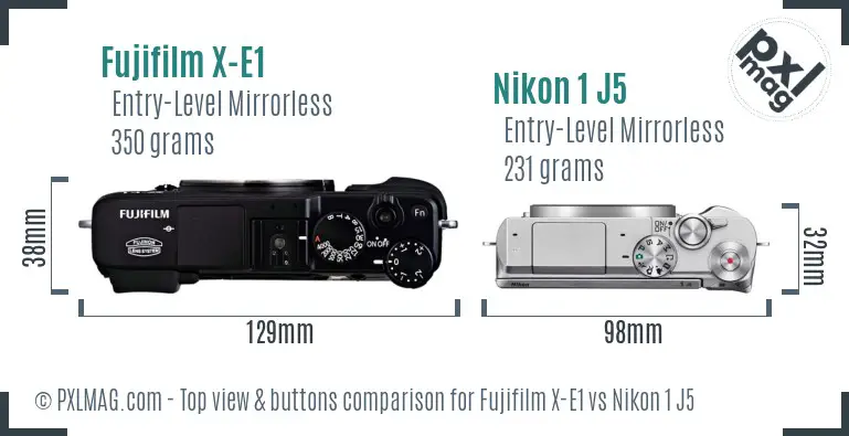 Fujifilm X-E1 vs Nikon 1 J5 top view buttons comparison