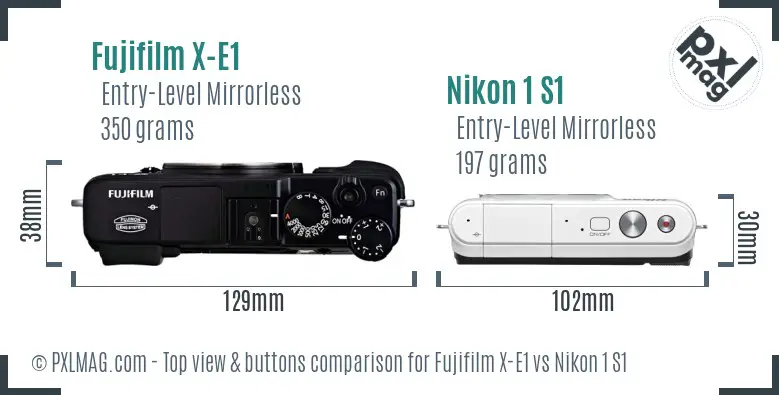 Fujifilm X-E1 vs Nikon 1 S1 top view buttons comparison