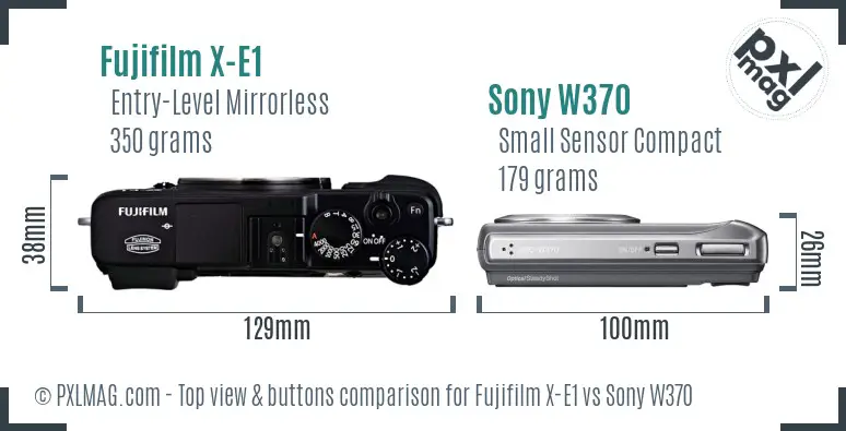 Fujifilm X-E1 vs Sony W370 top view buttons comparison