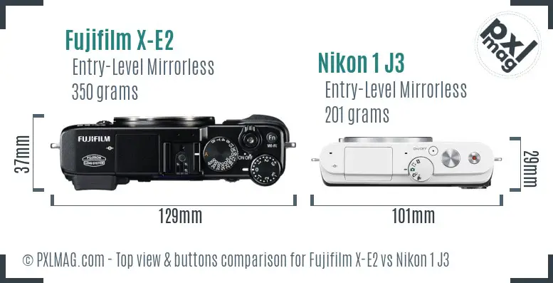 Fujifilm X-E2 vs Nikon 1 J3 top view buttons comparison