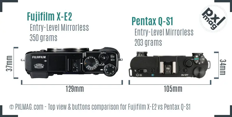 Fujifilm X-E2 vs Pentax Q-S1 top view buttons comparison Fujifilm X-E2 vs Pentax Q-S1 top view buttons comparison