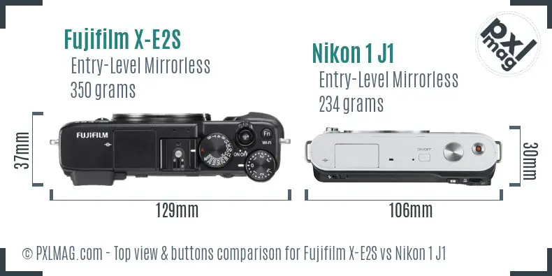 Fujifilm X-E2S vs Nikon 1 J1 top view buttons comparison Fujifilm X-E2S vs Nikon 1 J1 top view buttons comparison