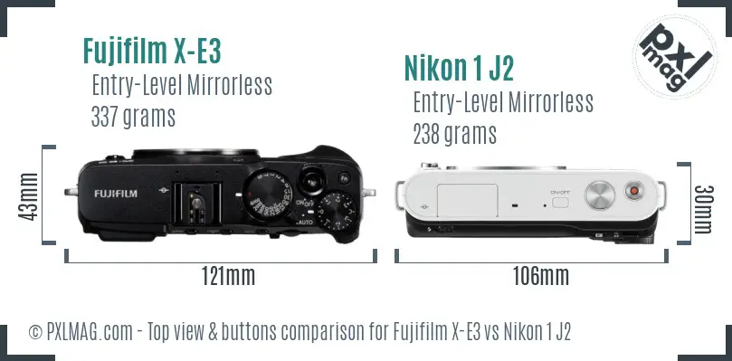 Fujifilm X-E3 vs Nikon 1 J2 top view buttons comparison
