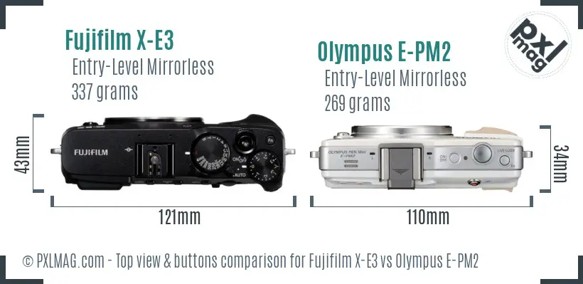 Fujifilm X-E3 vs Olympus E-PM2 top view buttons comparison