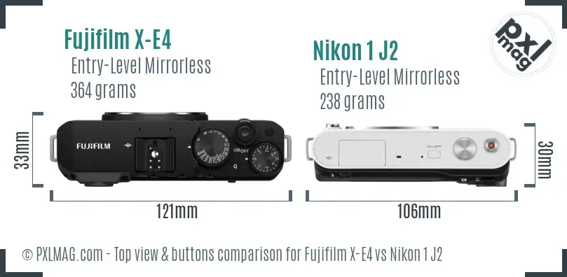 Fujifilm X-E4 vs Nikon 1 J2 top view buttons comparison