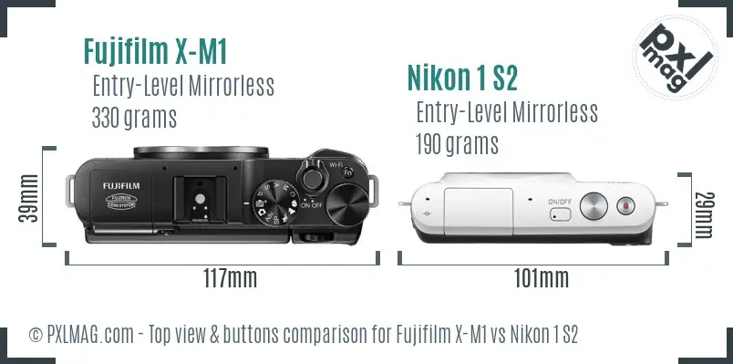 Fujifilm X-M1 vs Nikon 1 S2 top view buttons comparison