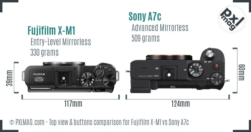 Fujifilm X-M1 vs Sony A7c top view buttons comparison