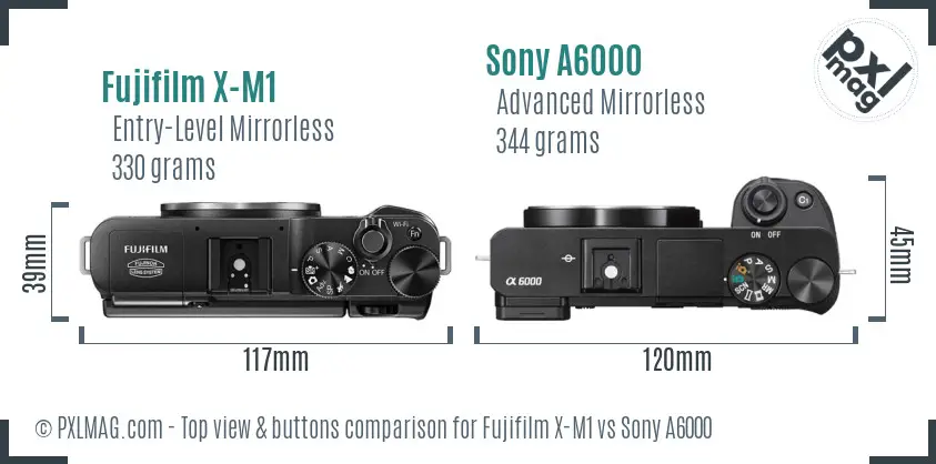 Fujifilm X-M1 vs Sony A6000 top view buttons comparison Fujifilm X-M1 vs Sony A6000 top view buttons comparison