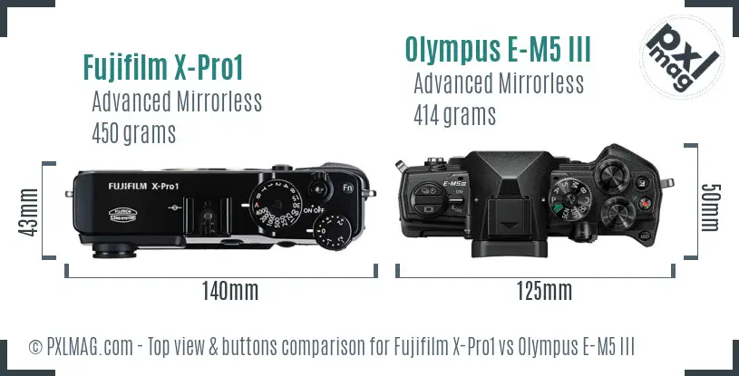 Fujifilm X-Pro1 vs Olympus E-M5 III top view buttons comparison