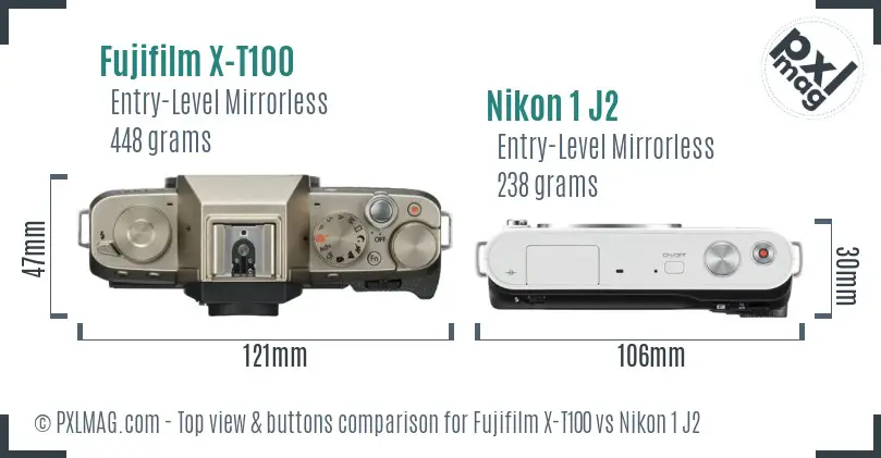 Fujifilm X-T100 vs Nikon 1 J2 top view buttons comparison