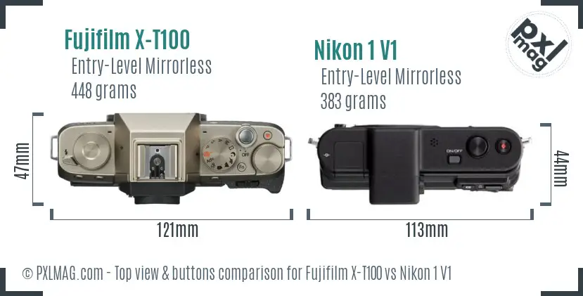 Fujifilm X-T100 vs Nikon 1 V1 top view buttons comparison