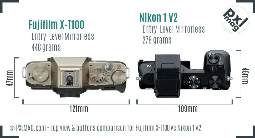 Fujifilm X-T100 vs Nikon 1 V2 top view buttons comparison