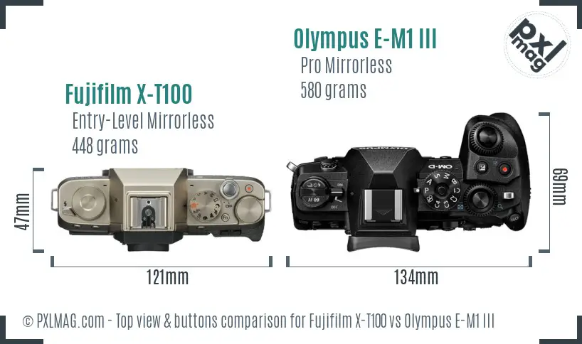 Fujifilm X-T100 vs Olympus E-M1 III top view buttons comparison Fujifilm X-T100 vs Olympus E-M1 III top view buttons comparison