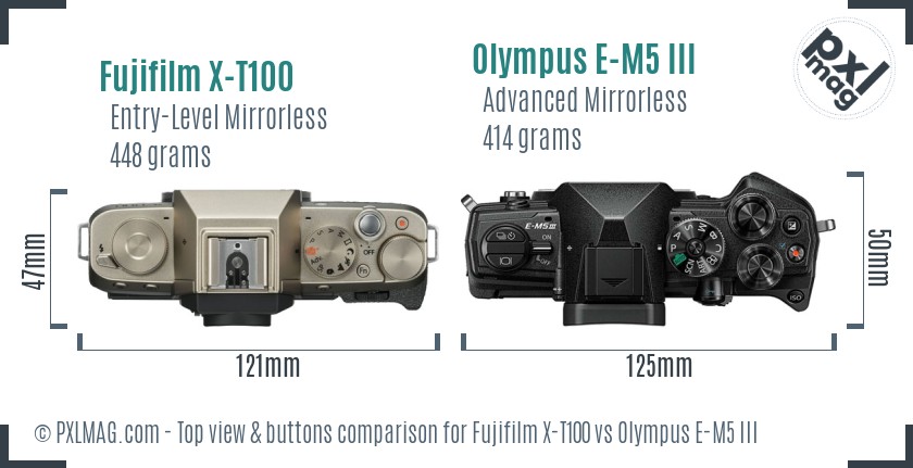 Fujifilm X-T100 vs Olympus E-M5 III top view buttons comparison