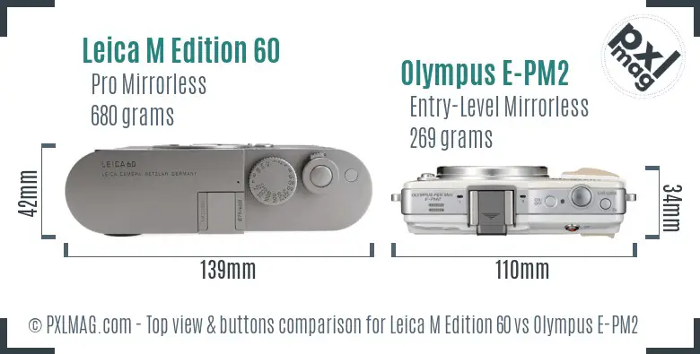 Leica M Edition 60 vs Olympus E-PM2 top view buttons comparison Leica M Edition 60 vs Olympus E-PM2 top view buttons comparison
