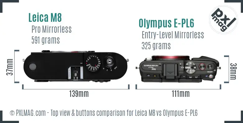 Leica M8 vs Olympus E-PL6 top view buttons comparison Leica M8 vs Olympus E-PL6 top view buttons comparison