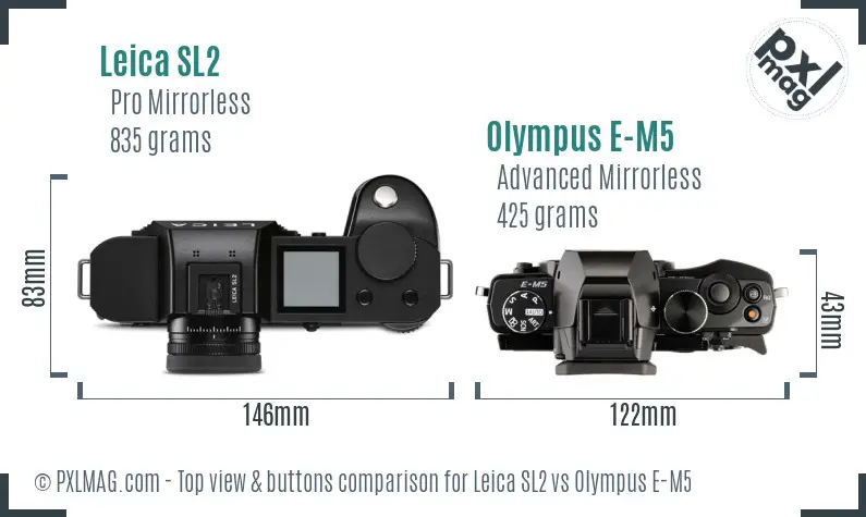 Leica SL2 vs Olympus E-M5 top view buttons comparison Leica SL2 vs Olympus E-M5 top view buttons comparison