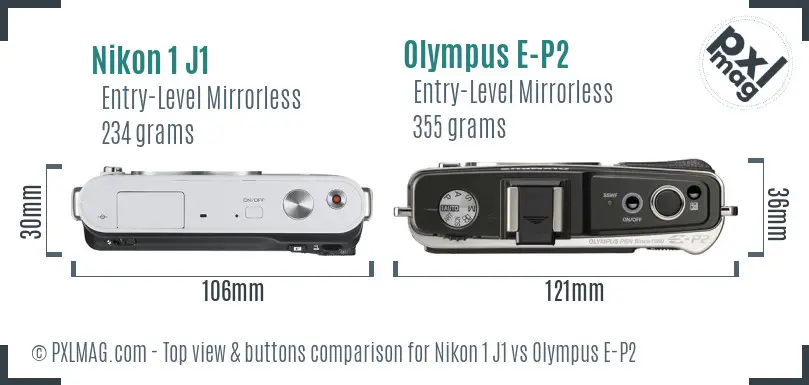 Nikon 1 J1 vs Olympus E-P2 top view buttons comparison Nikon 1 J1 vs Olympus E-P2 top view buttons comparison