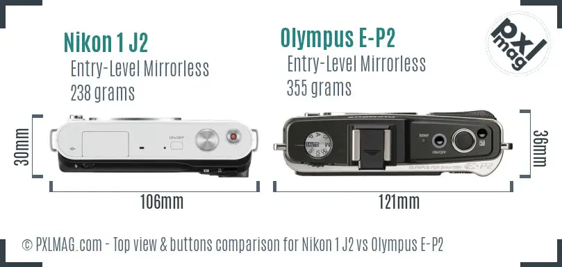 Nikon 1 J2 vs Olympus E-P2 top view buttons comparison Nikon 1 J2 vs Olympus E-P2 top view buttons comparison