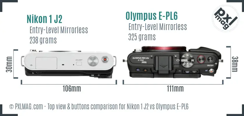 Nikon 1 J2 vs Olympus E-PL6 top view buttons comparison Nikon 1 J2 vs Olympus E-PL6 top view buttons comparison