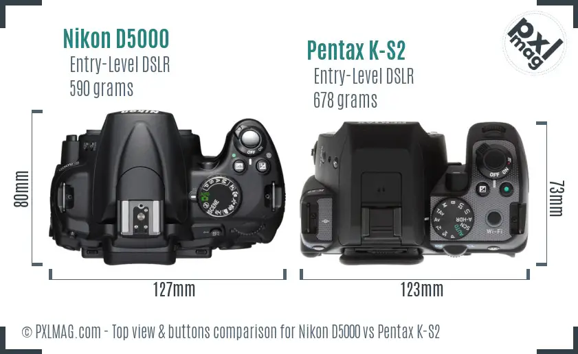 Nikon D5000 vs Pentax K-S2 top view buttons comparison