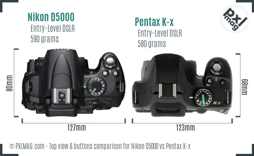 Nikon D5000 vs Pentax K-x top view buttons comparison