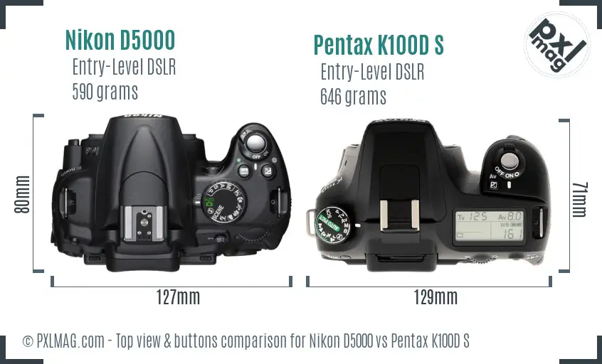 Nikon D5000 vs Pentax K100D S top view buttons comparison Nikon D5000 vs Pentax K100D S top view buttons comparison