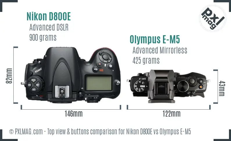 Nikon D800E vs Olympus E-M5 top view buttons comparison